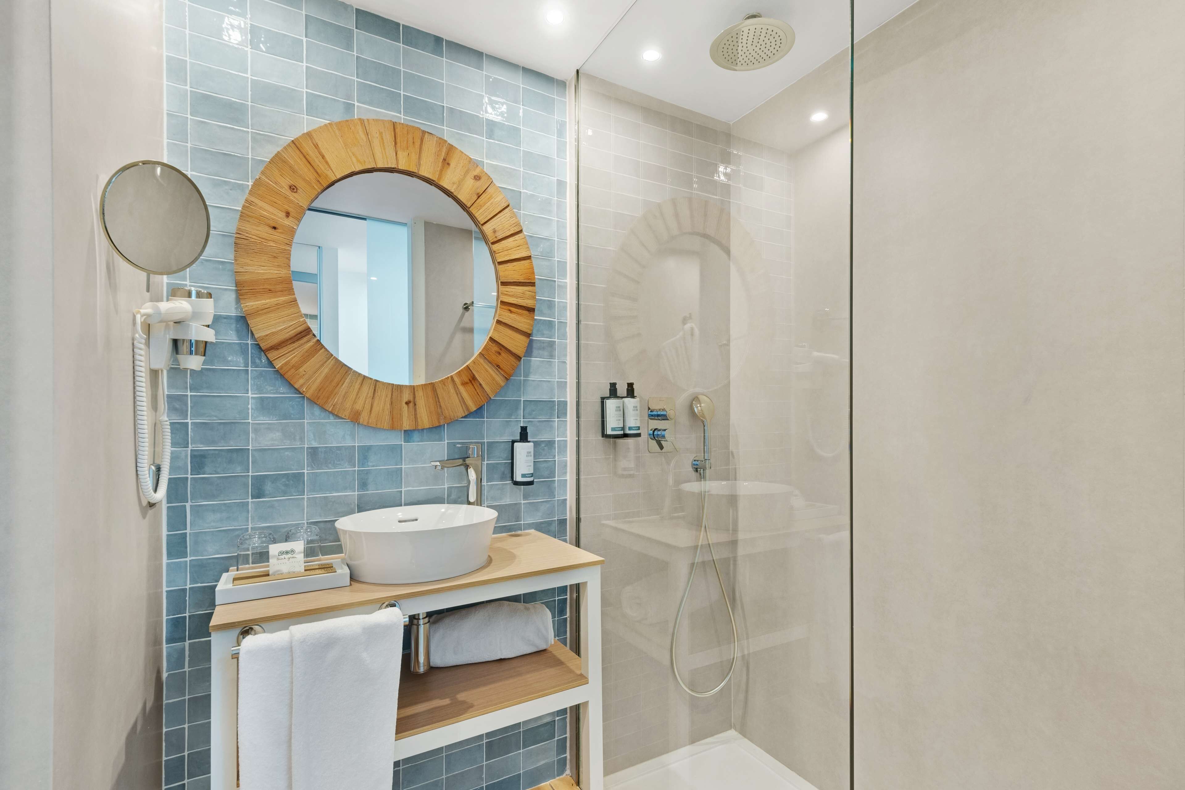 Shower, rainfall showerhead, eco-friendly toiletries, hair dryer