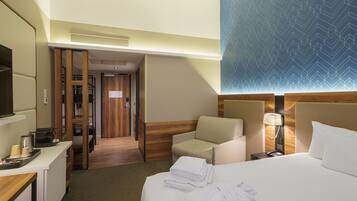 Premium Triple Room | Premium bedding, in-room safe, desk, blackout drapes