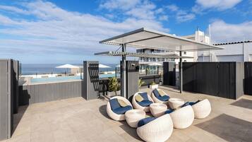 2 outdoor pools, pool umbrellas, pool loungers