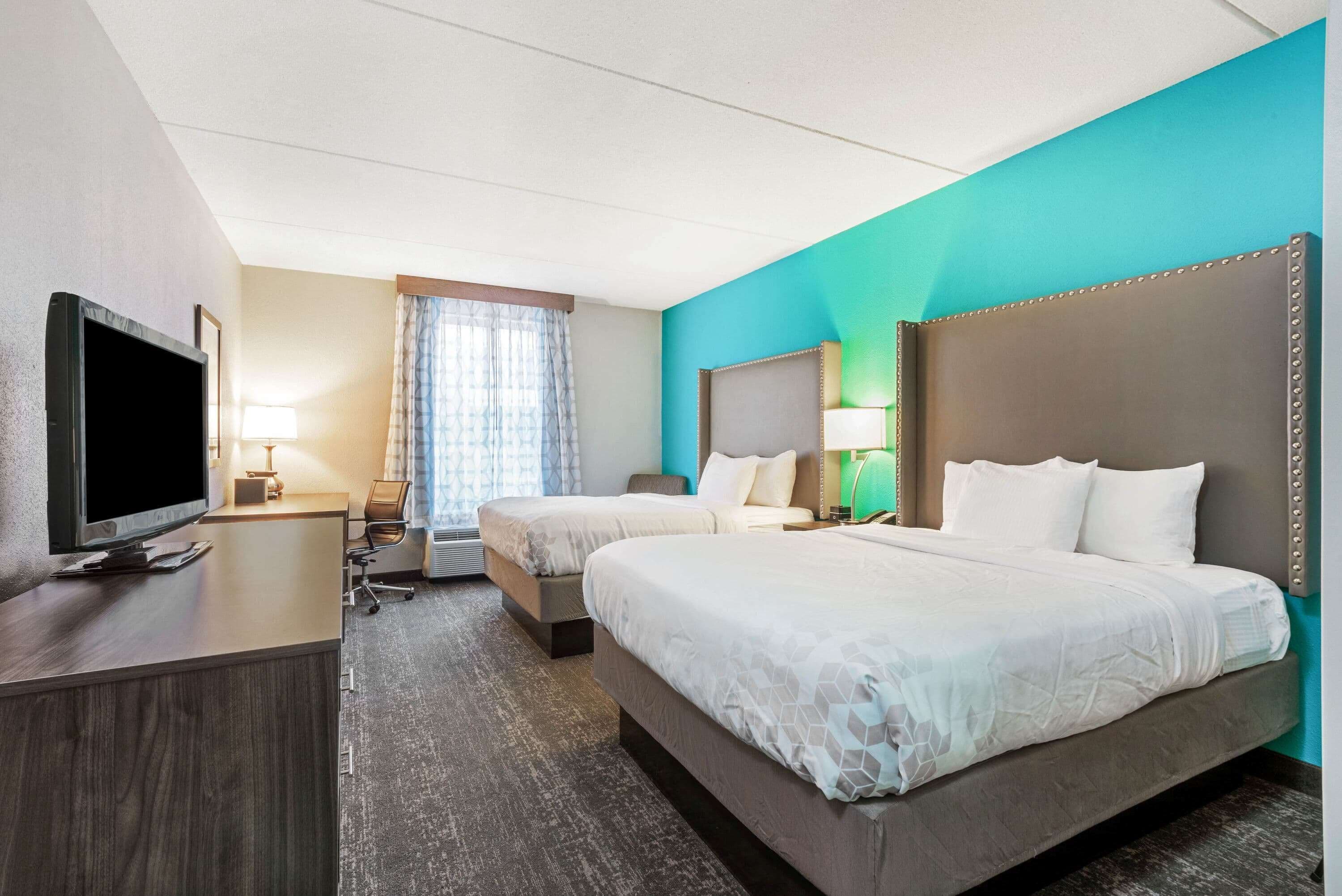 premium bedding, down duvets, pillow-top beds, in-room safe