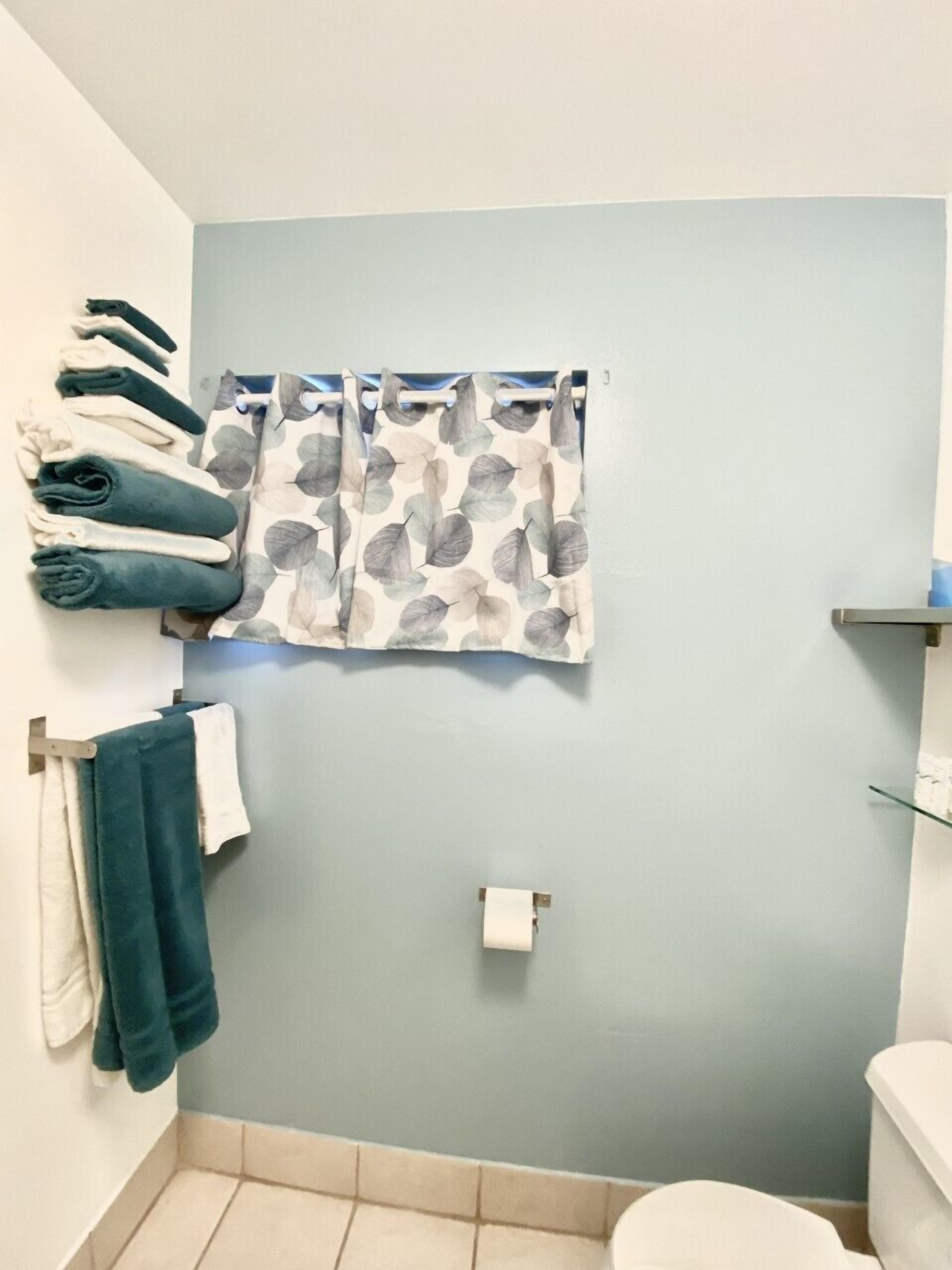 Foto - Bluebird Day Inn & Suites