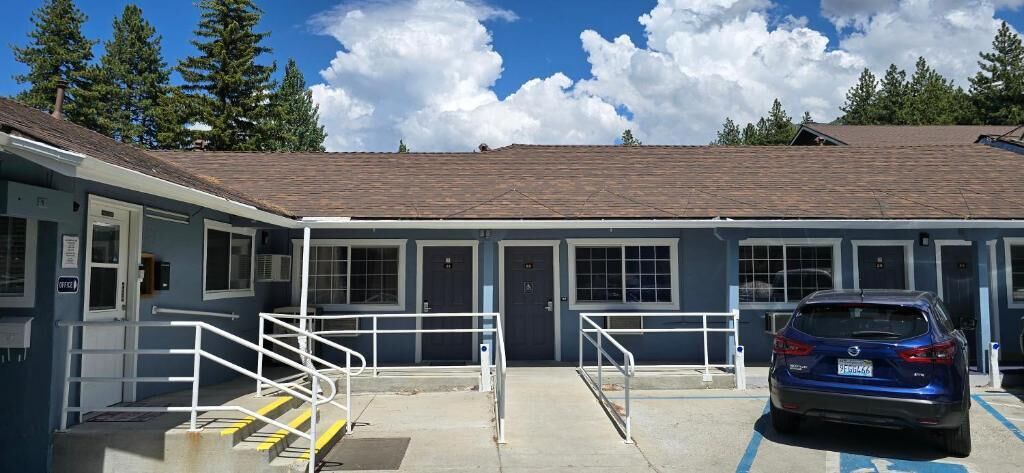 Foto - Bluebird Day Inn & Suites