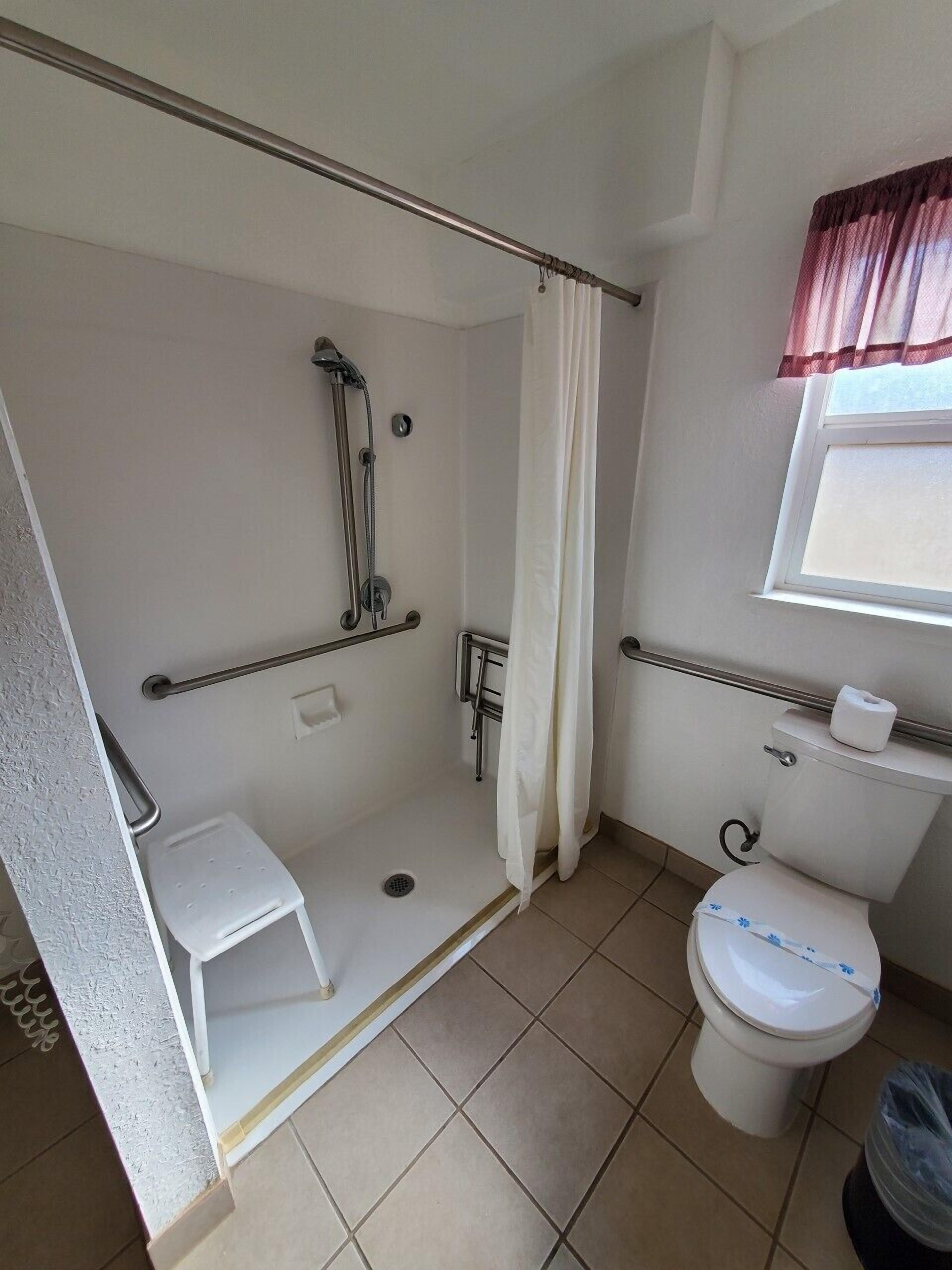 Foto - Bluebird Day Inn & Suites