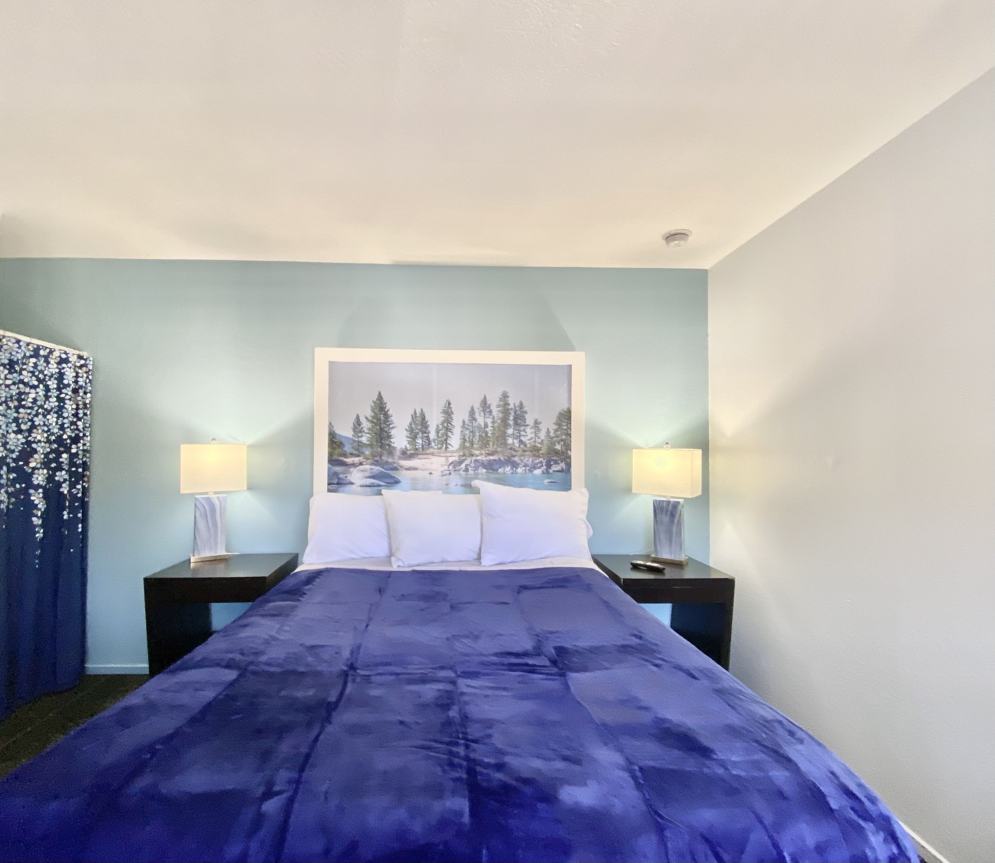 Foto - Bluebird Day Inn & Suites