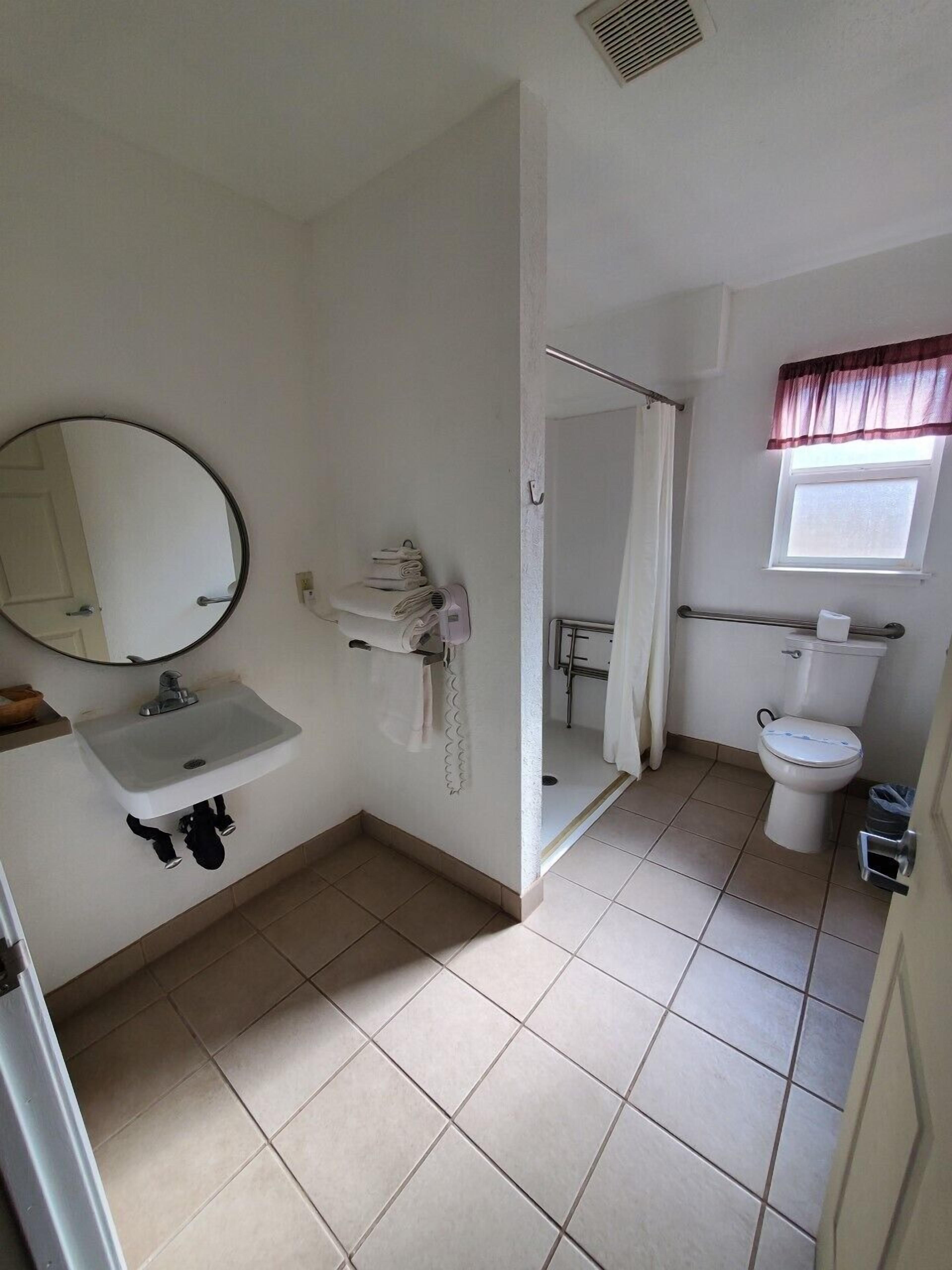 Foto - Bluebird Day Inn & Suites