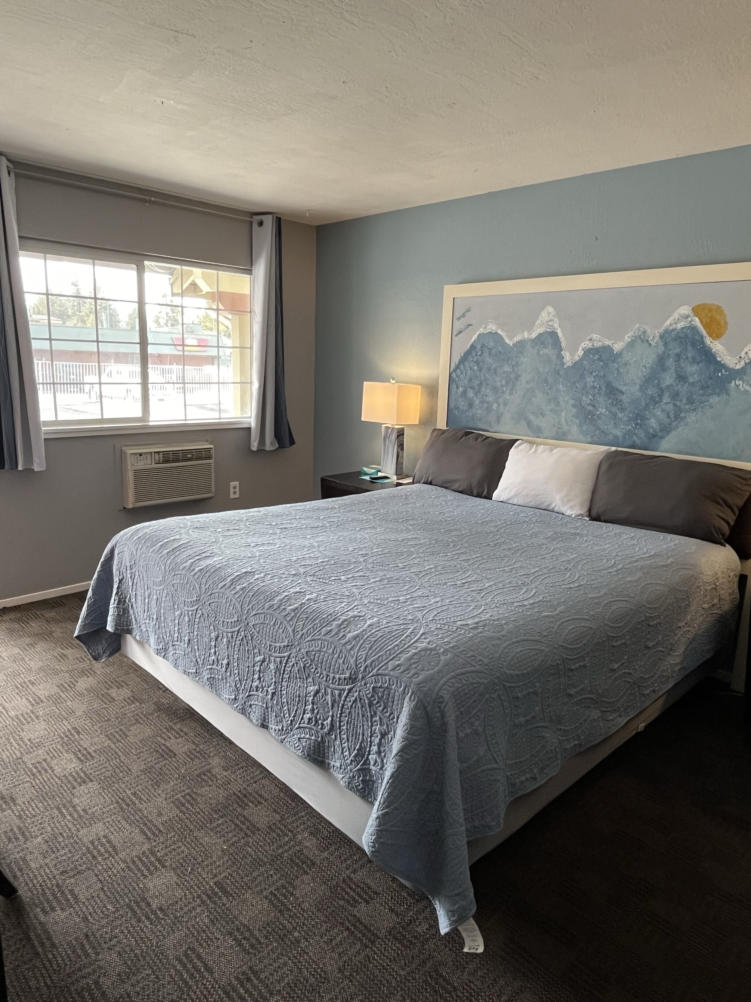 Foto - Bluebird Day Inn & Suites