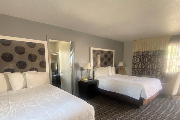 Family Room | Premium bedding, pillow-top beds, individually decorated