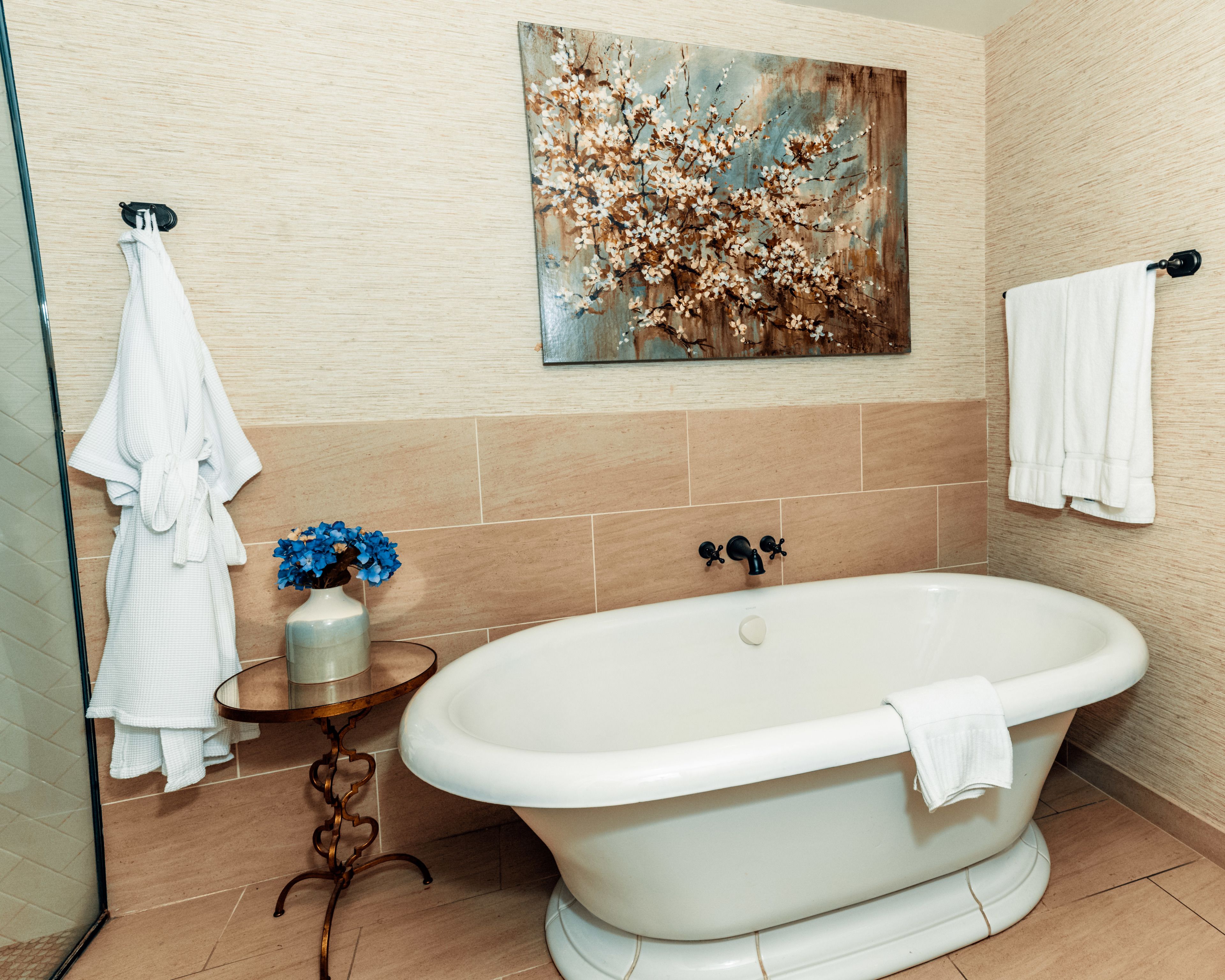 designer toiletries, hair dryer, bathrobes, towels