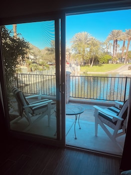 Deluxe Room | Terrace/patio at The Chateau at Lake La Quinta