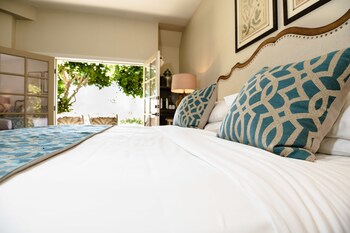 Superior Room, Lake View | Egyptian cotton sheets, premium bedding, down comforters, pillowtop beds at The Chateau at Lake La Quinta