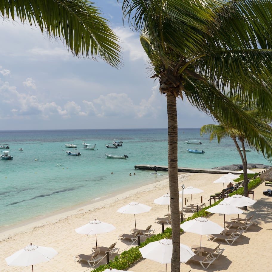 On the beach, sun loungers, beach umbrellas, beach towels