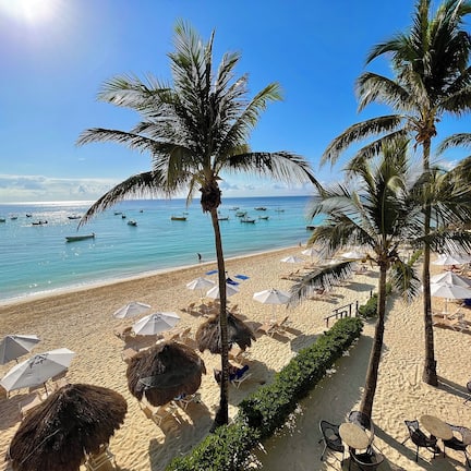 On the beach, sun loungers, beach umbrellas, beach towels