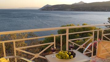 Laptop workspace, blackout curtains, bed sheets