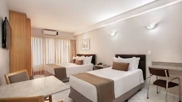 Deluxe Triple Room | Hypo-allergenic bedding, minibar, in-room safe, desk