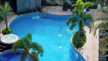 Outdoor pool, open 10:00 AM to 10:00 PM, pool umbrellas, sun loungers