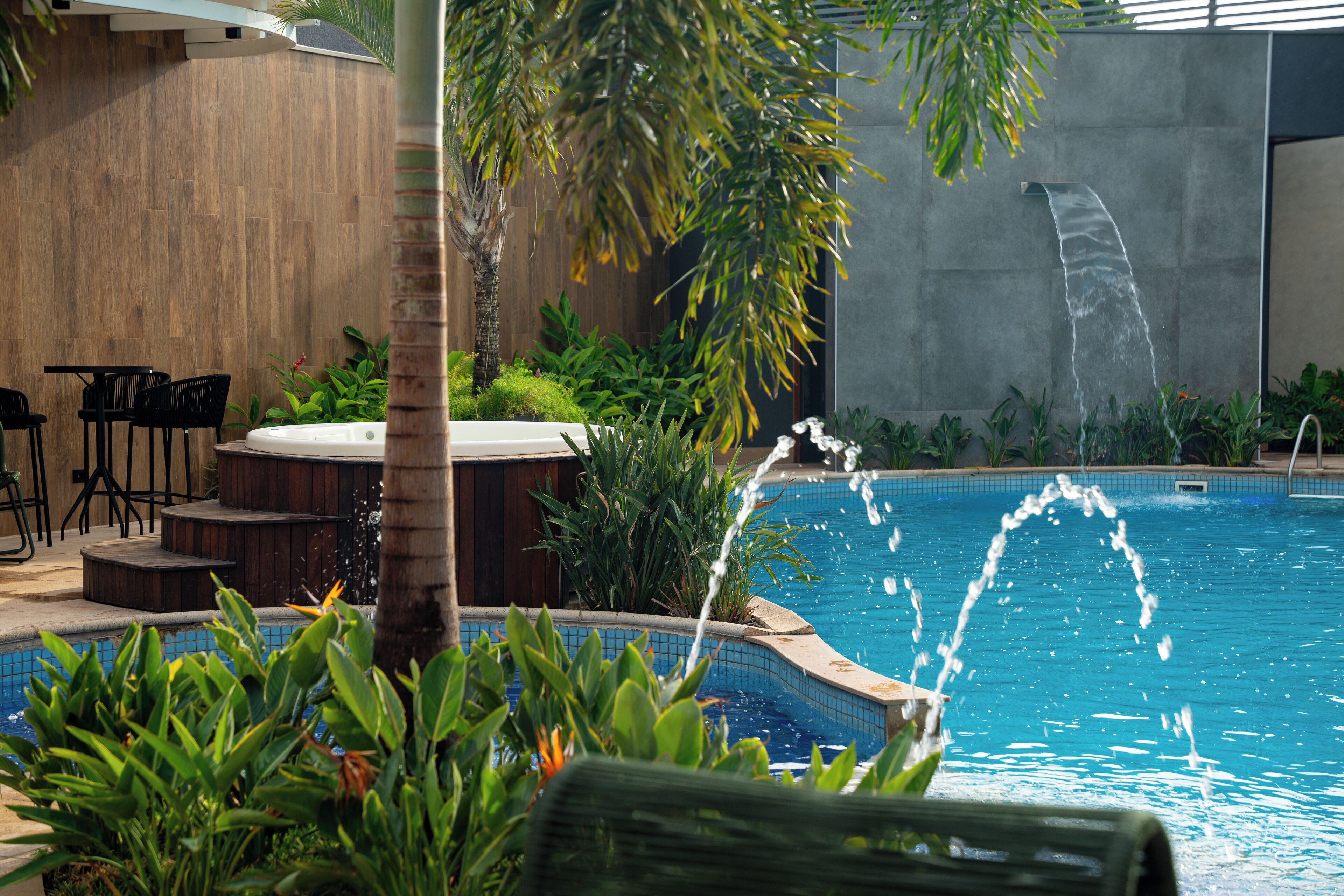 outdoor pool, open 10:00 am to 10:00 pm, pool umbrellas, pool loungers