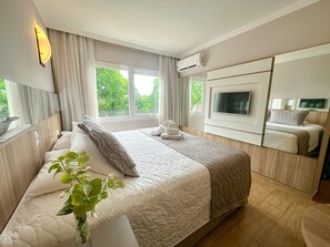 Deluxe Double Room | Minibar, in-room safe, desk, blackout curtains