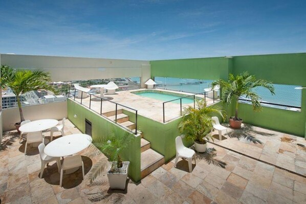 Outdoor pool, open 9:00 AM to 8:00 PM, sun loungers