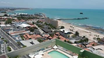 Outdoor pool, open 9:00 AM to 8:00 PM, pool loungers