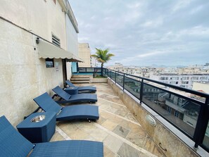 Outdoor pool, sun loungers
