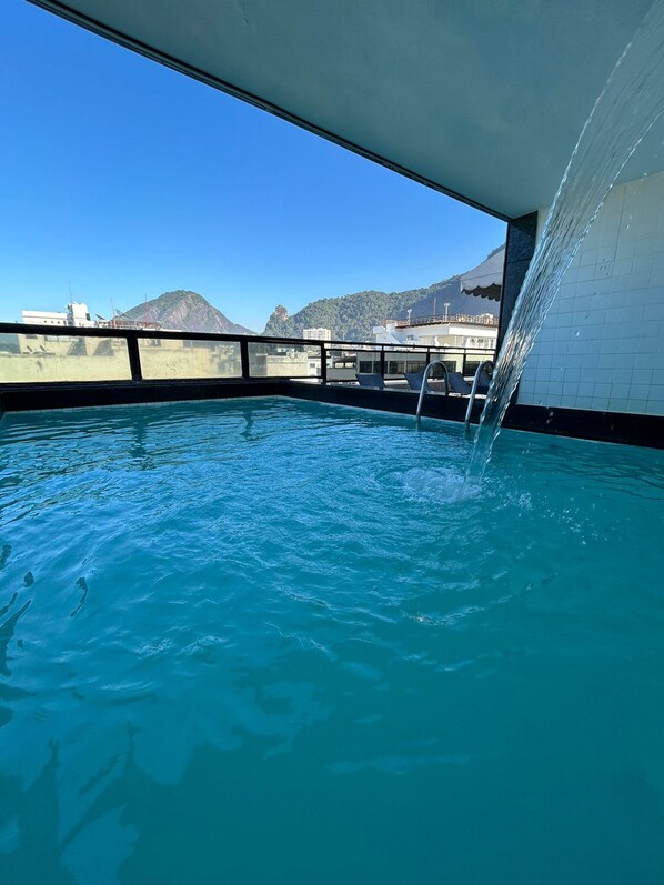 Outdoor pool, sun loungers