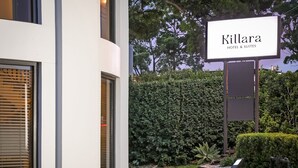 A modern building with a sign for 'Killara Hotel & Suites'. - Killara Hotel & Suites (Killara)