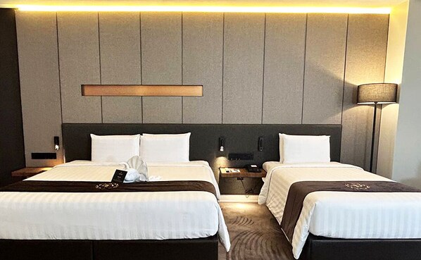 Executive Deluxe Studio (comes with free breakfast , hi tea & supper) | 1 bedroom, in-room safe, desk, laptop workspace