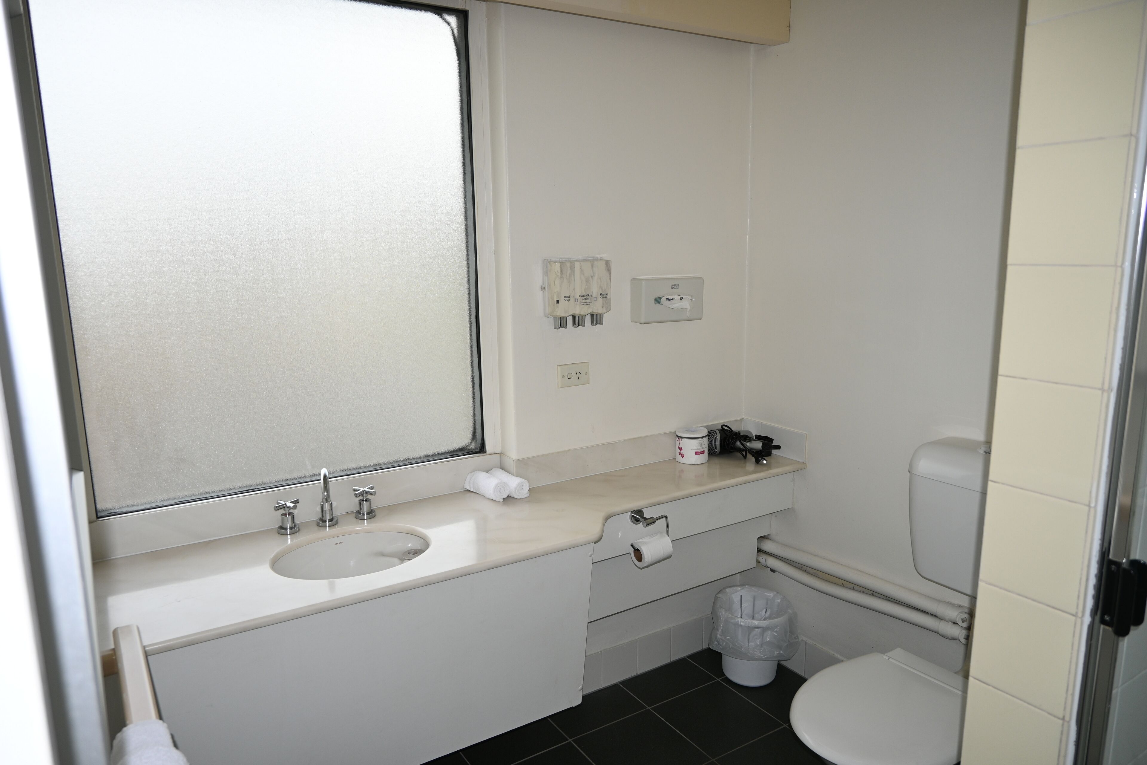 family room | bathroom | shower, hair dryer, towels