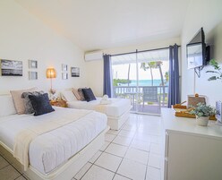 Room, Ocean View | Desk, blackout drapes, iron/ironing board, free WiFi