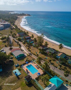 On the beach, sun-loungers, beach umbrellas, beach towels