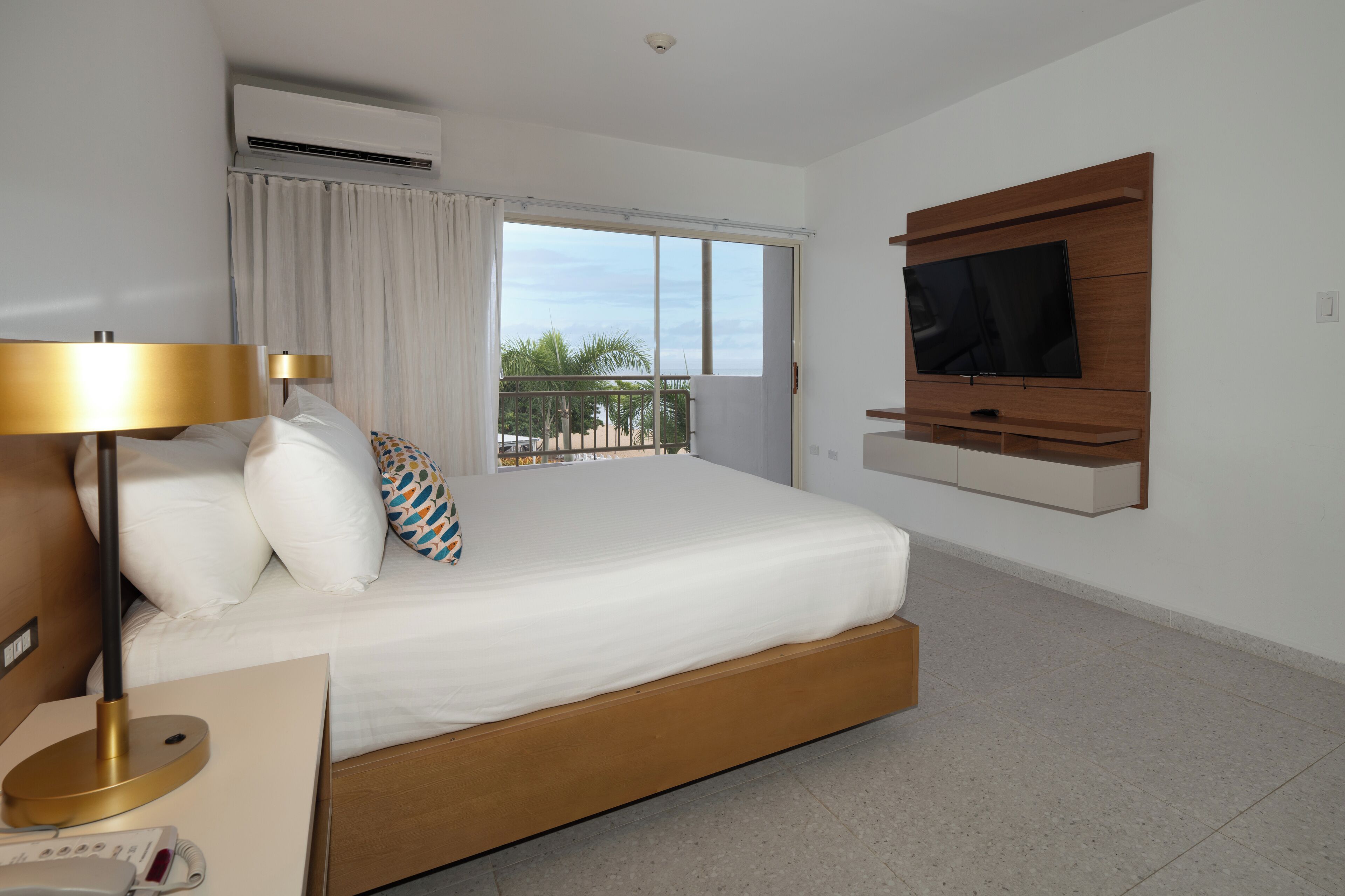 suite, 1 bedroom, kitchenette, beach view | 1 bedroom, in-room safe, individually decorated, individually furnished