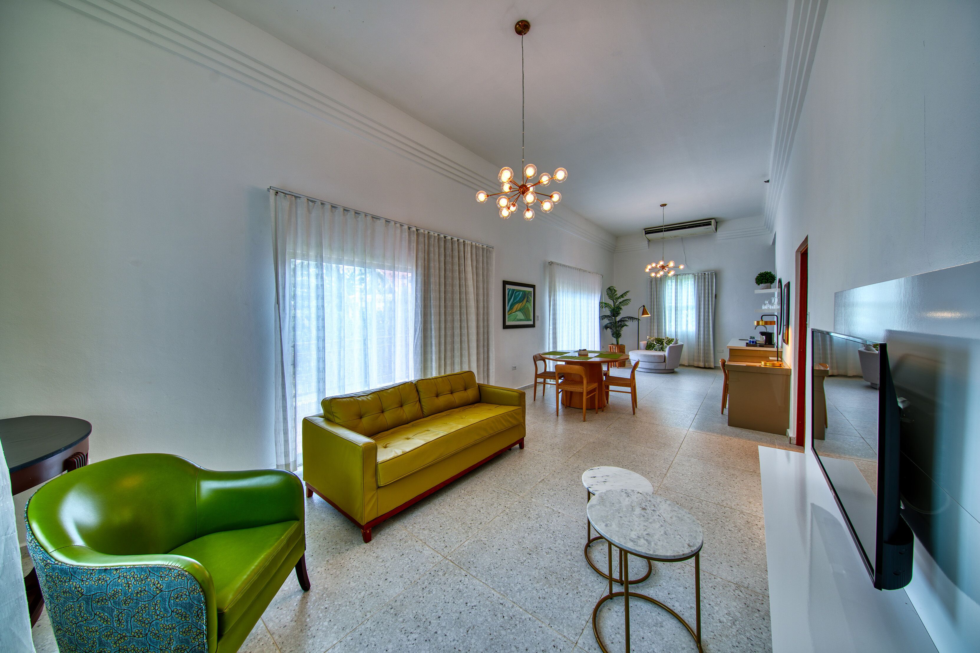 suite, 1 bedroom, kitchenette, beach view | living area | 48-inch tv with satellite channels