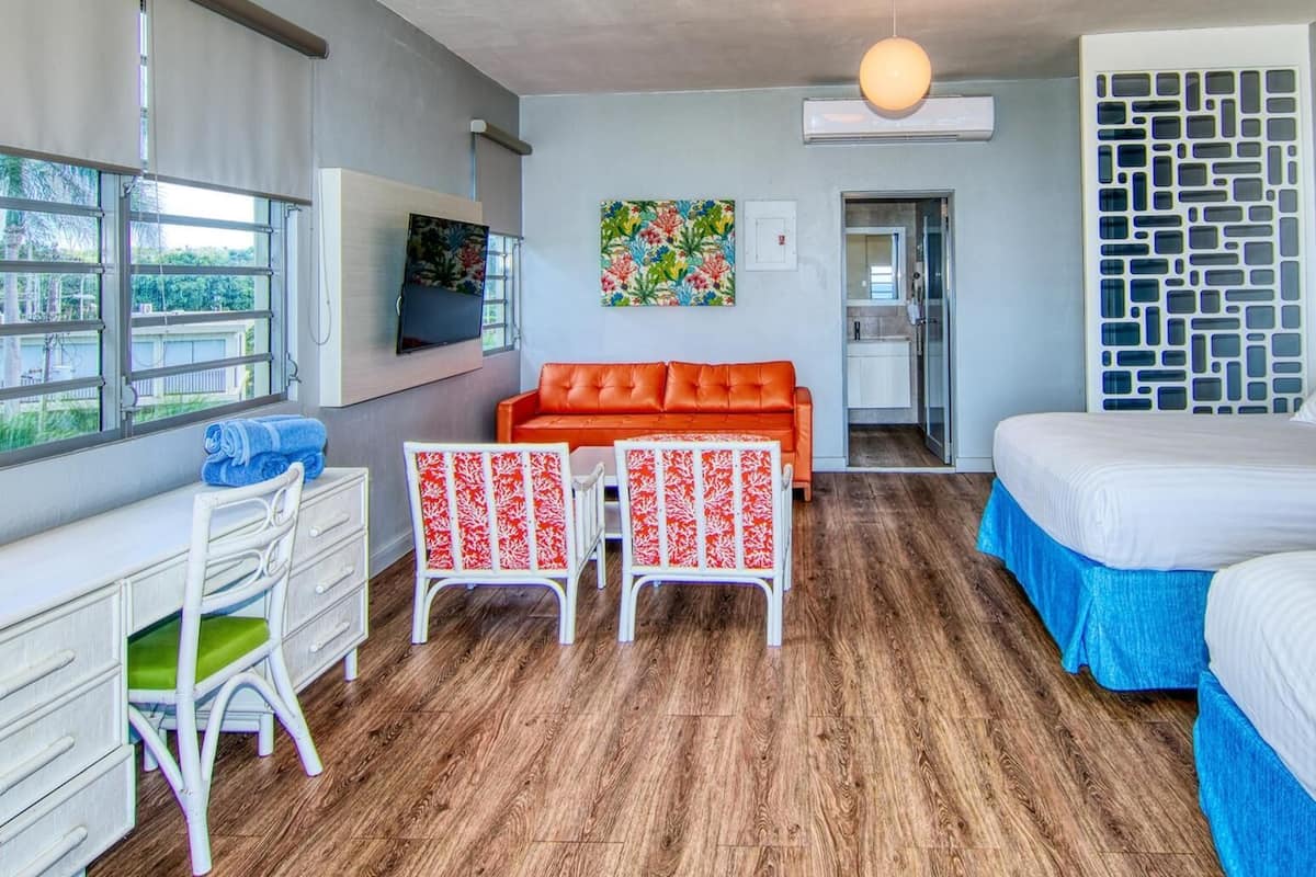 apartment, ocean view, beachfront | living area | 48-inch tv with satellite channels