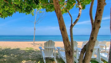 On the beach, sun loungers