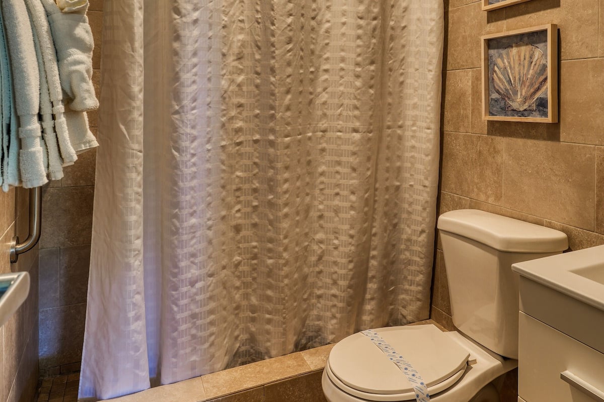 family villa | bathroom | shower, free toiletries, hair dryer, towels