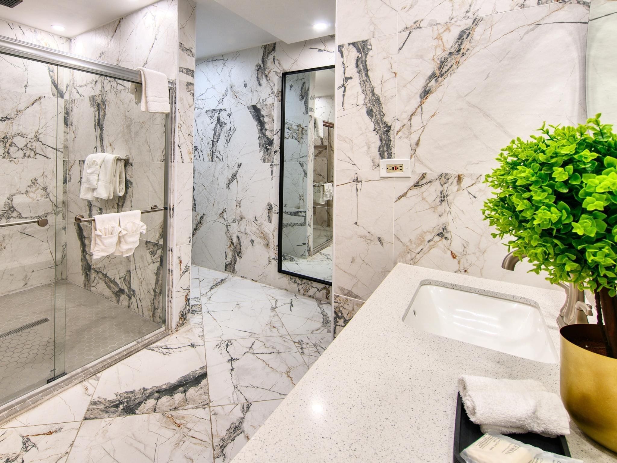 suite, 1 bedroom, kitchenette, beach view | bathroom | shower, free toiletries, hair dryer, towels