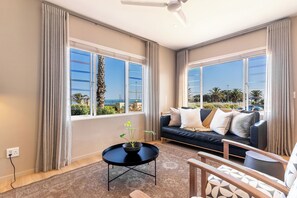 Tidal Pool- Two Bedroom 8BC | Living area | 32-inch Smart TV with digital channels, TV, Netflix - Camps Bay Village (Cape Town)