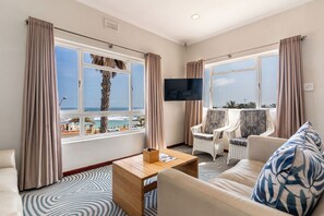 Tidal Pool- 3 Bedroom Panoramic Apartment | Living area | 32-inch Smart TV with digital channels, TV, Netflix - Camps Bay Village (Cape Town)