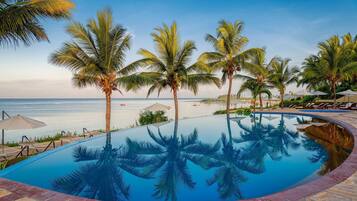 2 outdoor pools, pool umbrellas, sun loungers