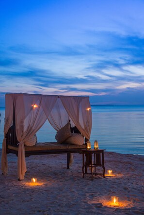 On the beach, white sand, free beach cabanas, sun-loungers