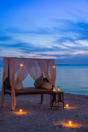 On the beach, white sand, free beach cabanas, sun-loungers