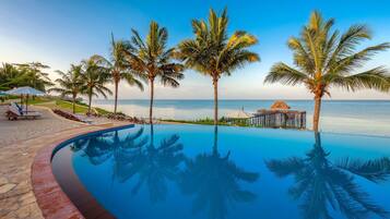 2 outdoor pools, pool umbrellas, pool loungers