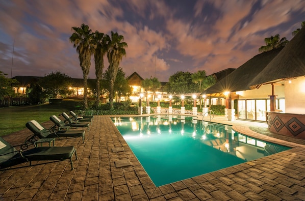 Outdoor pool, pool umbrellas, sun loungers