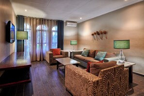Junior Suite | In-room safe, desk, laptop workspace, iron/ironing board