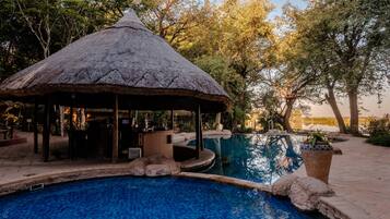 Outdoor pool, pool umbrellas, pool loungers