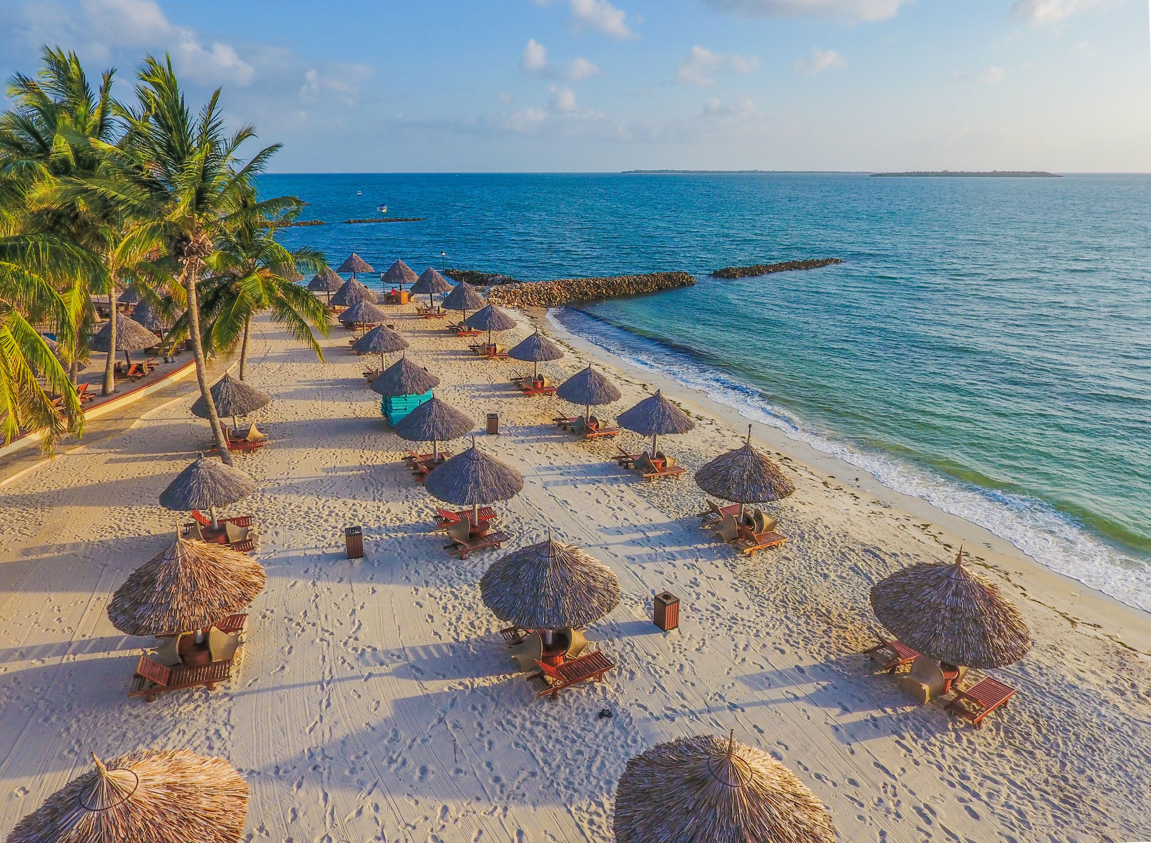 Private beach, white sand, sun loungers, beach umbrellas
