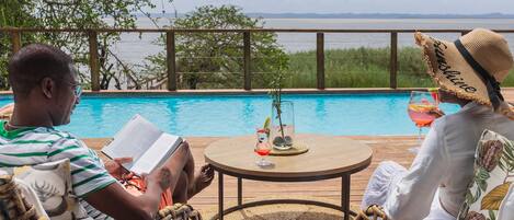 Outdoor pool, pool umbrellas, sun loungers