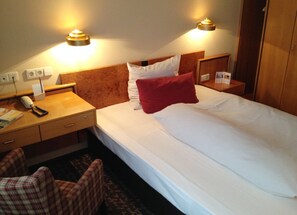 Premium bedding, down duvets, minibar, in-room safe