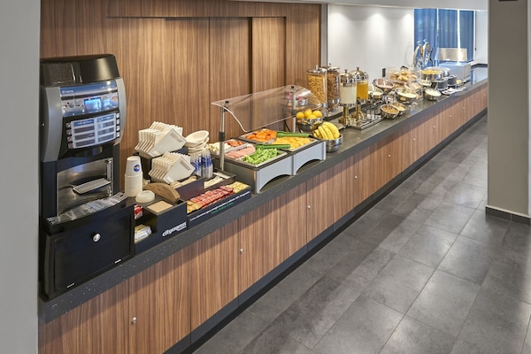 Free daily self-serve breakfast