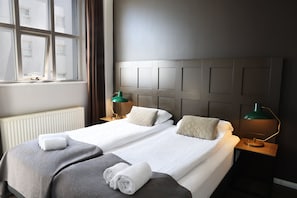 Family Room | In-room safe, desk, blackout drapes, iron/ironing board